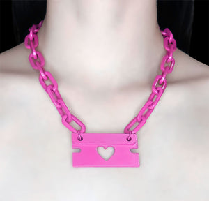 pink razor blade necklace